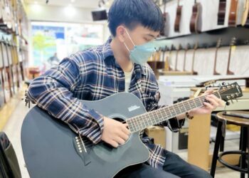 shop guitar bình phước